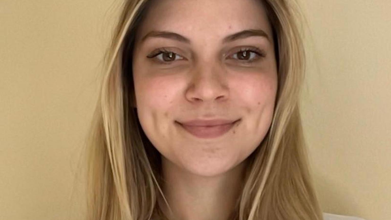 a person smiling at the camera