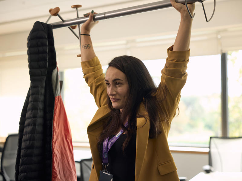 a person holding up a swinger