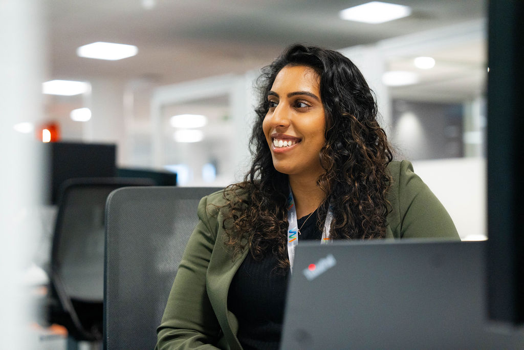 a person sitting at a computer