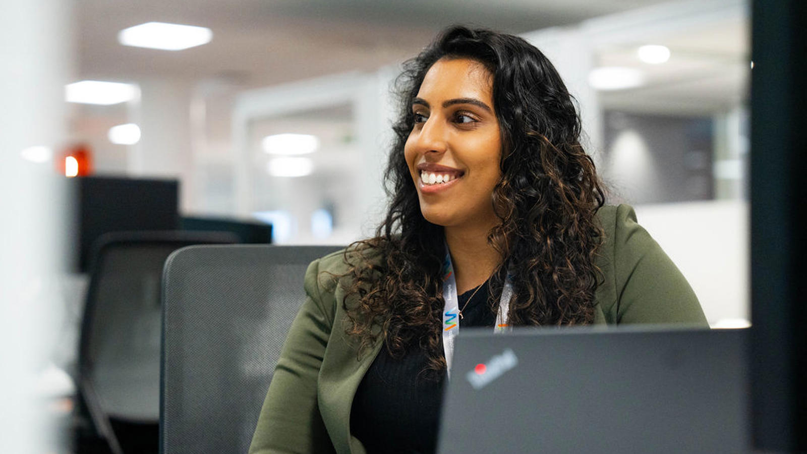 a person sitting at a computer
