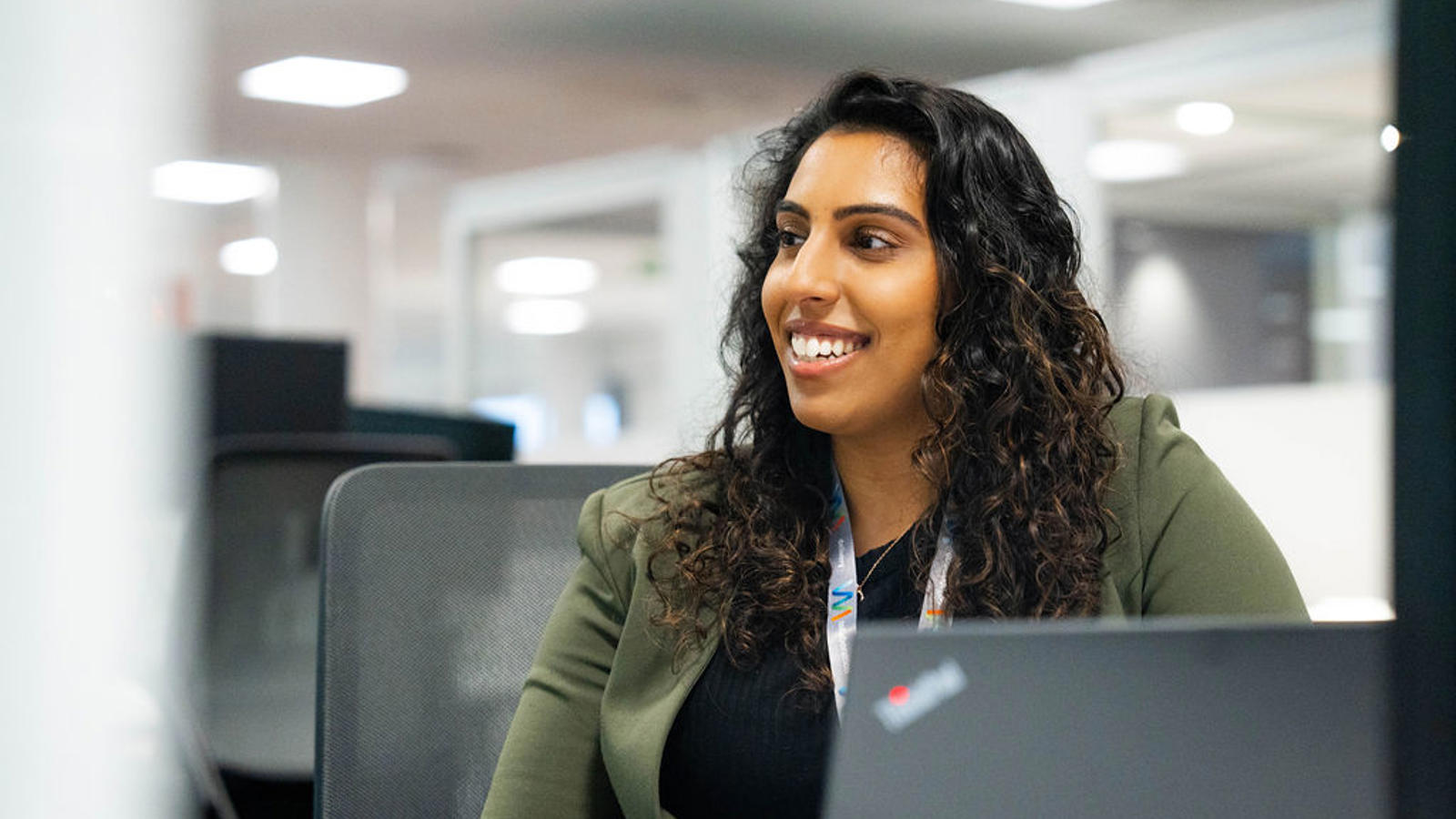 a person sitting at a computer