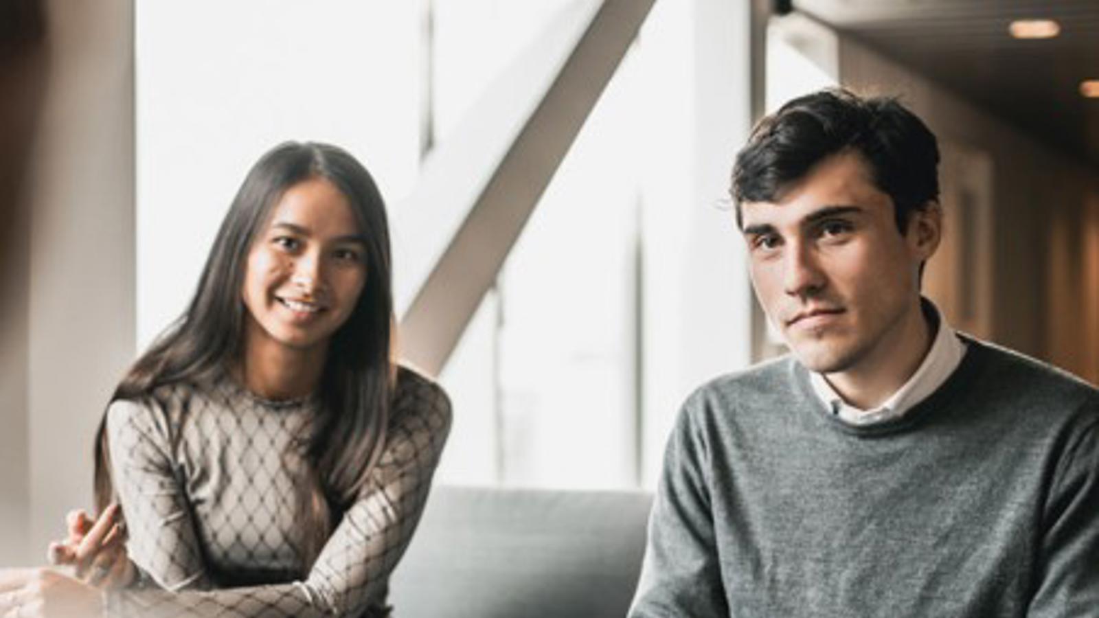 a person and person sitting on a couch
